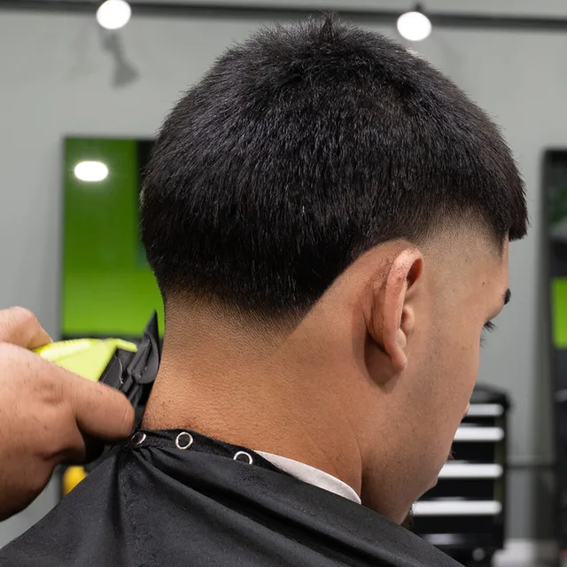 Taper haircut at Blades Vision Barbershop in Houston, TX